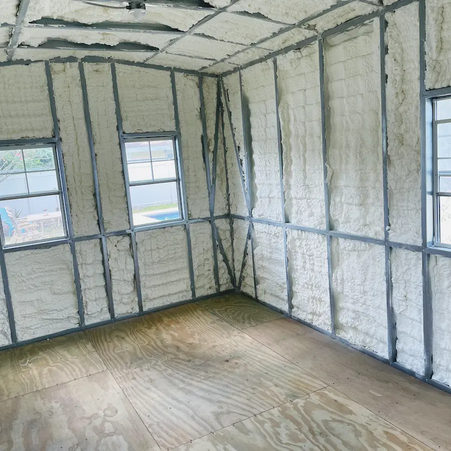 Closed-cell spray foam insulation applied to wall cavities in a residential project in Raritan